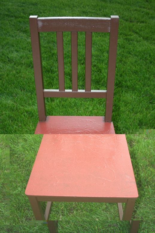 a chair painted brown and dark red