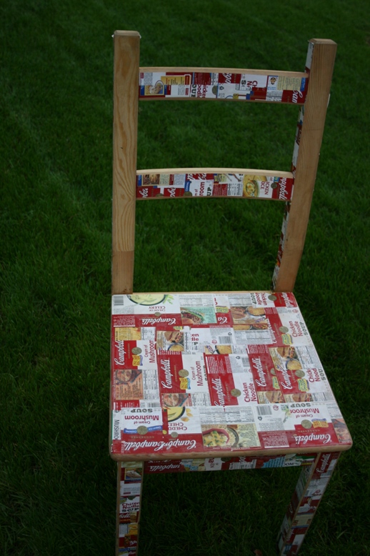 a chair covered in campbells' soup labels