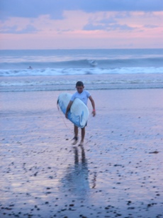 young surfer in costa rica